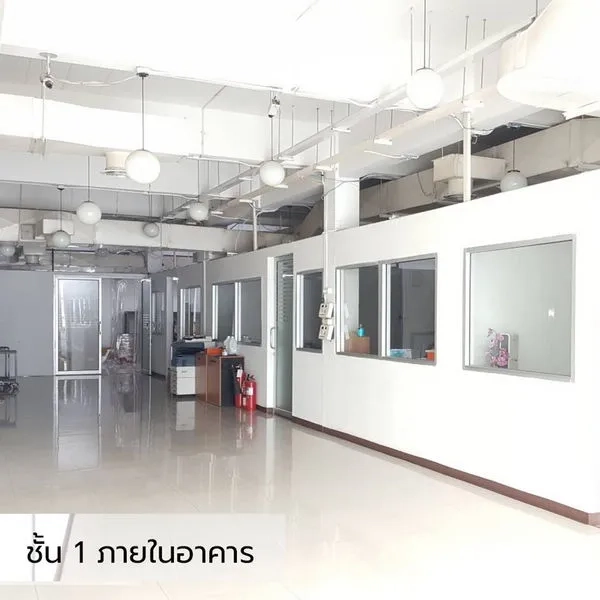 Office Space for rent in Bueng Kum, Bangkok - Ground-floor office area with white partitioned rooms, tiled floors and exposed ceiling lights.