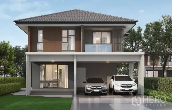 บ้าน ให้เช่าหรือขายในLam Luk Ka, Pathum Thani - มุมมองด้านหน้าบ้านเดี่ยวสองชั้นร่วมสมัย มีระเบียงและทางจอดรถ 2 คัน