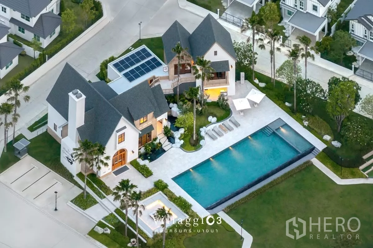 Detached House for rent in Bang Phli, Samut Prakan - Aerial view of clubhouse with swimming pool, sun deck and landscaped grounds.