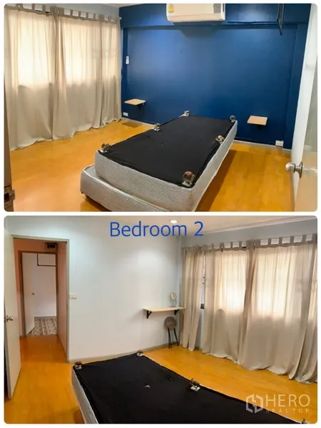 联排别墅 出租在Watthana, Bangkok - 第二卧室，蓝色特色墙，空调与暖色木地板。