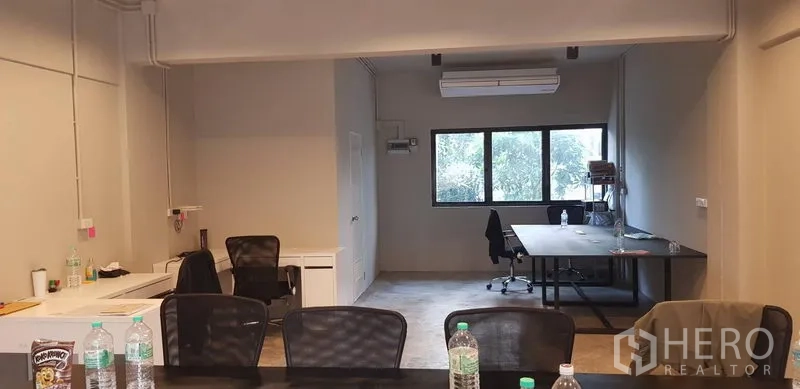 Office Space for rent in Khlong Toei, Bangkok - Open-plan office with desks, large window, air conditioner and polished concrete floor in Thonglor, Bangkok.