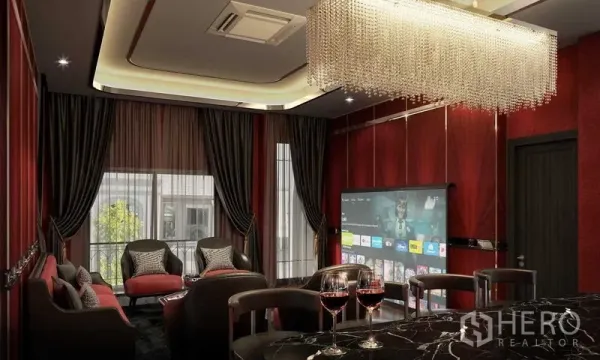 Detached House for sale in Prawet, Bangkok - Private cinema lounge with chandelier, red wall panels and a large screen for home entertainment.