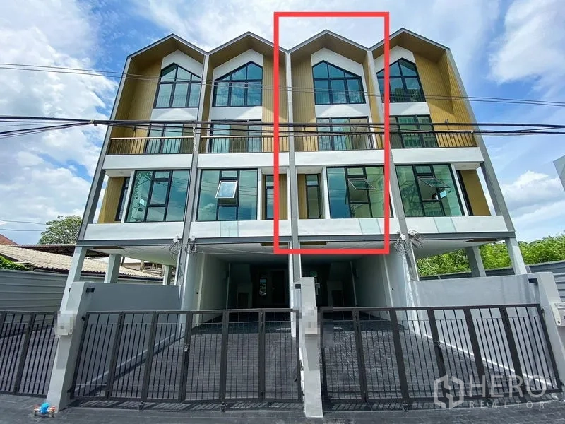 Home Office for rent or sale in Phra Khanong, Bangkok - Modern four-storey home office facade with large windows and gated parking, highlighted unit outlined.