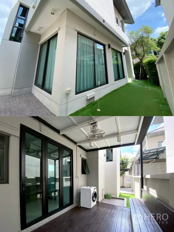 Detached House for rent in Bang Phli, Samut Prakan - Exterior of the detached house with synthetic grass lawn and covered utility deck with washing machine.