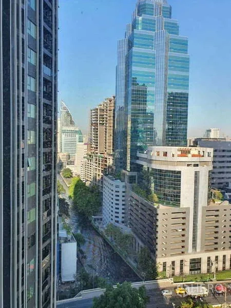 Condominium for rent - High-floor city view toward Phloen Chit skyline from the condo window.