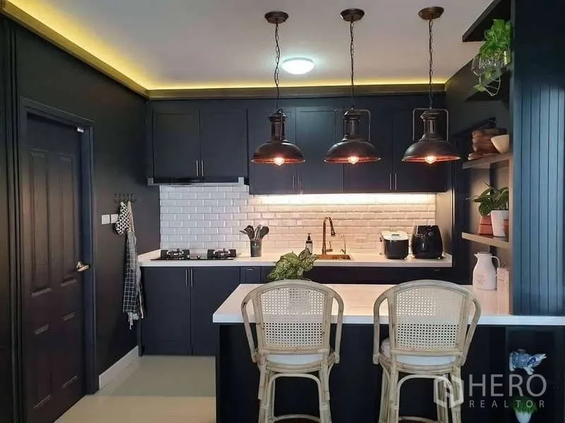 Detached House for sale in Bang Phli, Samut Prakan - Modern kitchen with white subway tiles, pendant lights and breakfast bar