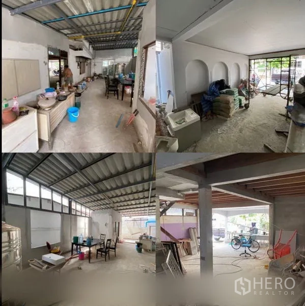 Home Office for rent in Suan Luang, Bangkok - Open-plan room with arched feature wall, concrete floors and large front glazing during refurbishment.