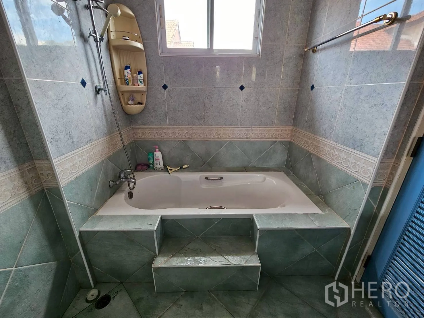 Detached House for rent or sale in Bang Lamung, Chon Buri - Bathroom with built-in bathtub and overhead shower.