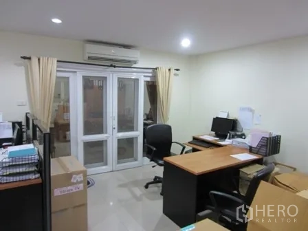 Home Office for rent or sale in Wang Thonglang, Bangkok - Bright home office room with desks, computers and glass French doors.
