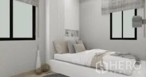 Detached House for rent or sale in Samut Prakan - Bright minimalist bedroom with double bed, soft neutral tones and two windows.