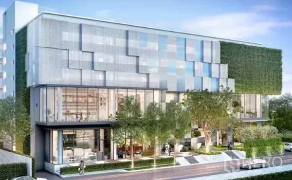 独立商业地产 出售在Watthana, Bangkok - 素坤逸区现代独立建筑，玻璃立面与绿化墙。