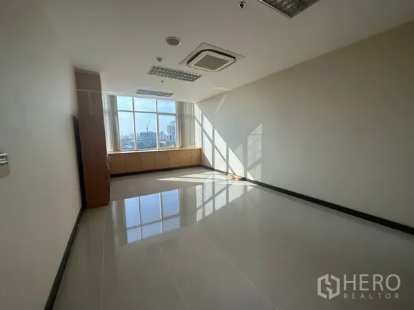Office Space for rent in Suan Luang, Bangkok - Private office with large window, city view and built-in lower cabinets.
