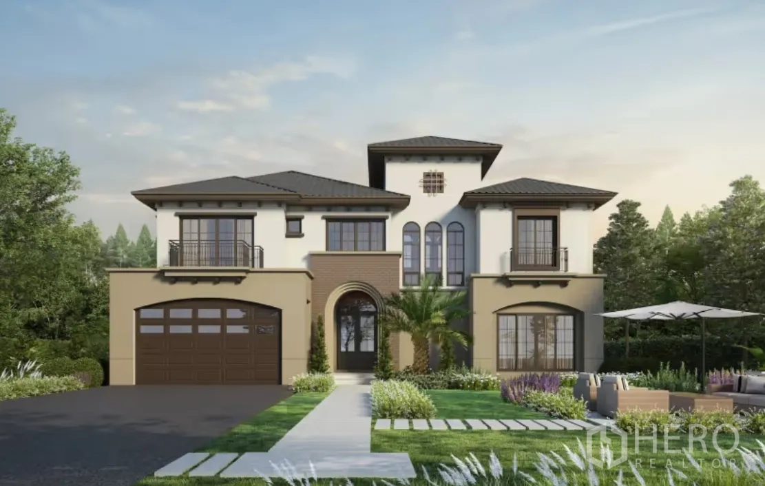 Detached House for rent in Lam Luk Ka, Pathum Thani - Modern Mediterranean facade with dark roof, arched doorway, small balconies, and a manicured yard with seating area.