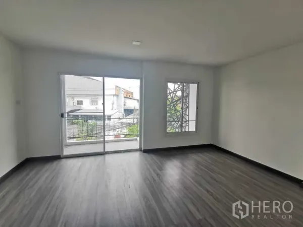 Home Office for rent or sale - Bedroom with sliding glass door to balcony and side window.