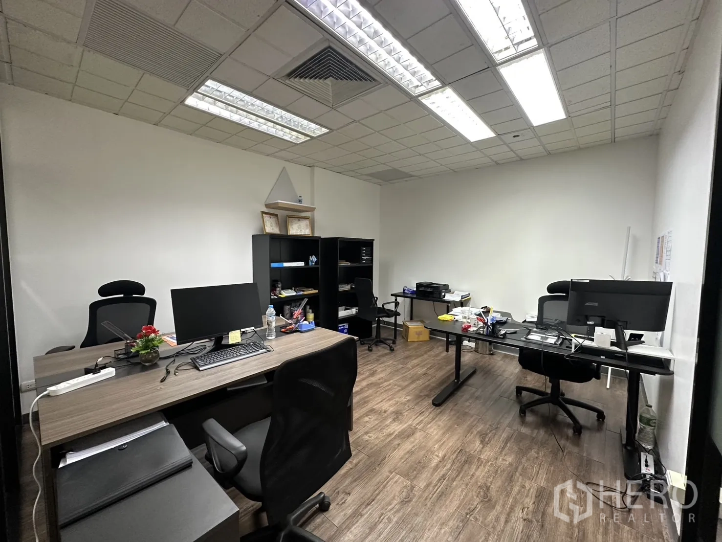 Office Space for rent - Enclosed office with ergonomic chairs and computer desks for focused work.