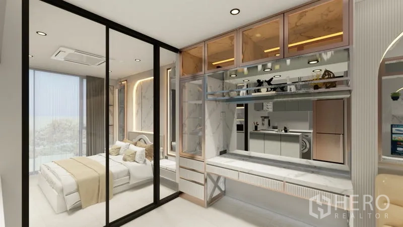 公寓 出租在Sathon, Bangkok - 镜面置物与工作台，正对卧室，后方可见紧凑厨房。