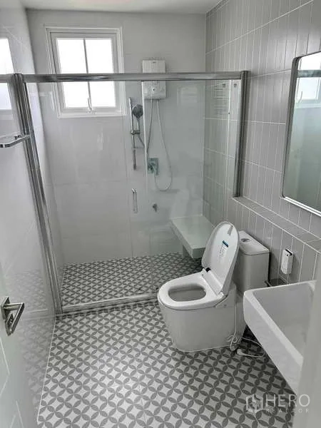 Detached House for sale in Bang Phli, Samut Prakan - Spacious bathroom with patterned floor tiles and walk-in glass shower