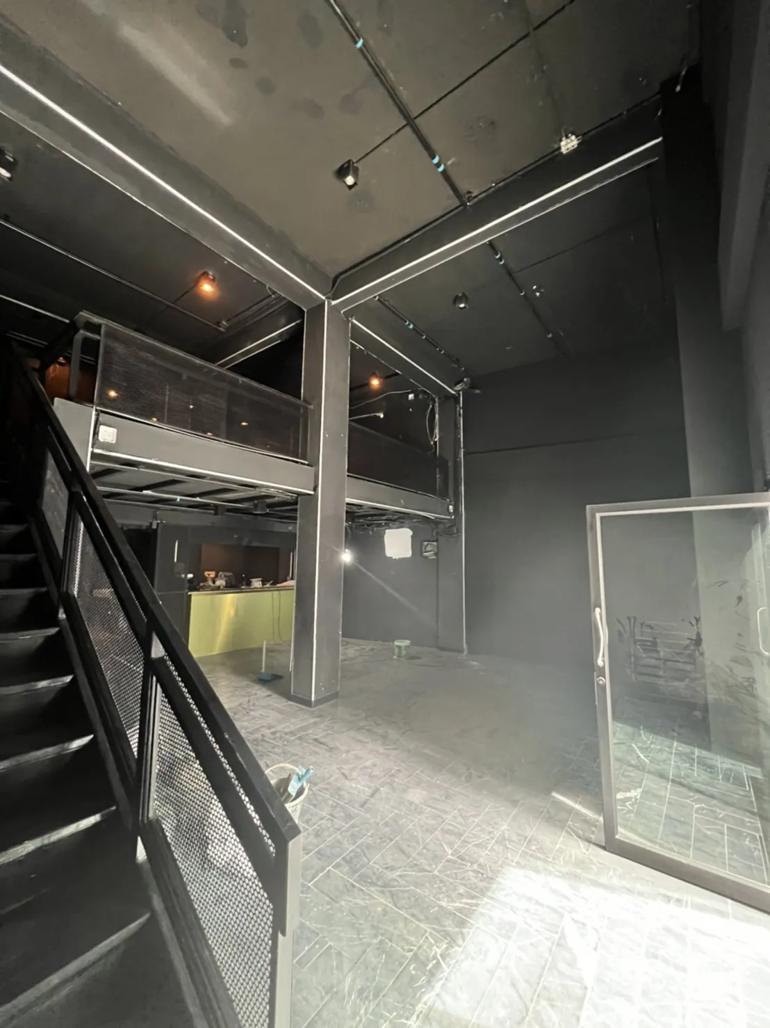 Home Office for rent or sale in Khlong Toei, Bangkok - Bright ground floor with sliding glass door and loft-style mezzanine.