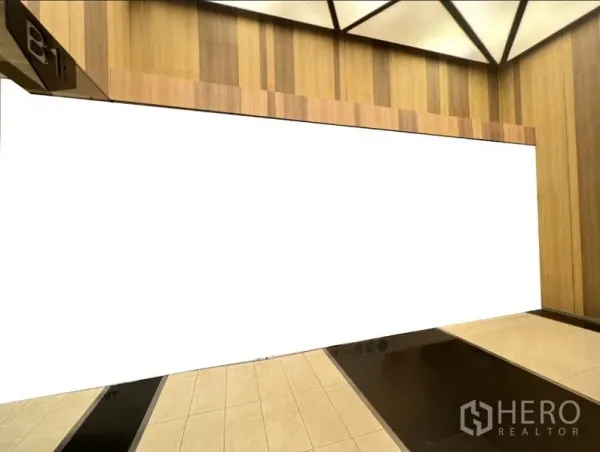 零售空间 出租在Watthana, Bangkok - 地下层宽阔店面立面，木饰面与抛光地砖。