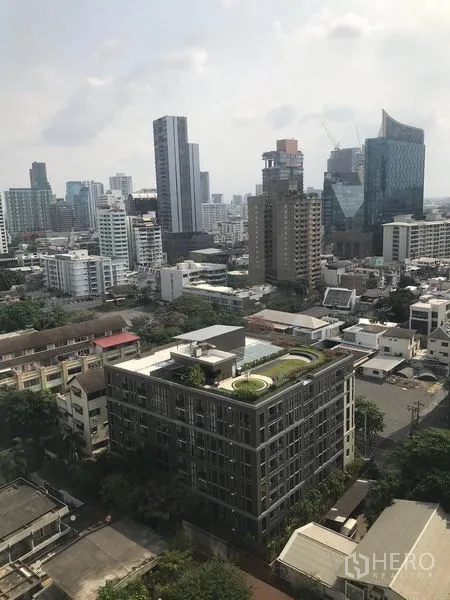 Condominium for rent in Watthana, Bangkok - High-rise city skyline view over Sukhumvit from the balcony.