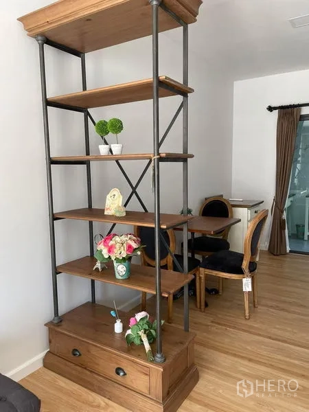 Townhouse for rent in Samut Prakan - Collage showing townhouse facade with gated front area, bright living room and furnished bedroom.