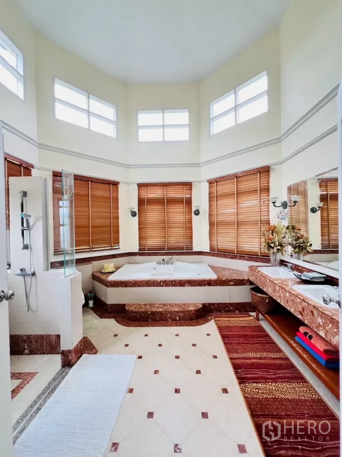 Detached House for rent in Prawet, Bangkok - Luxury bathroom with corner Jacuzzi tub, double vanity and glass shower.