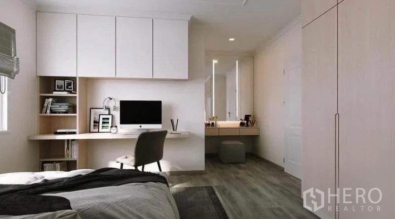 Detached House for rent in Bang Phli, Samut Prakan - Bedroom workspace with wall cabinets, desk and vanity connected to an ensuite.