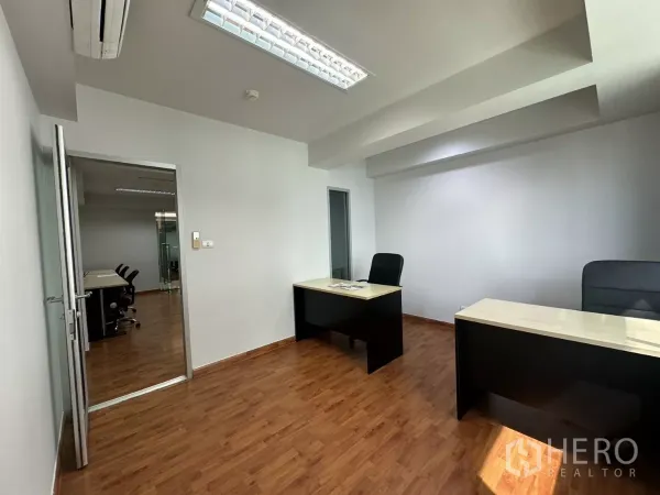 Office Space for rent in Watthana, Bangkok - Private office area with air-conditioning, LED lighting and wood laminate flooring.