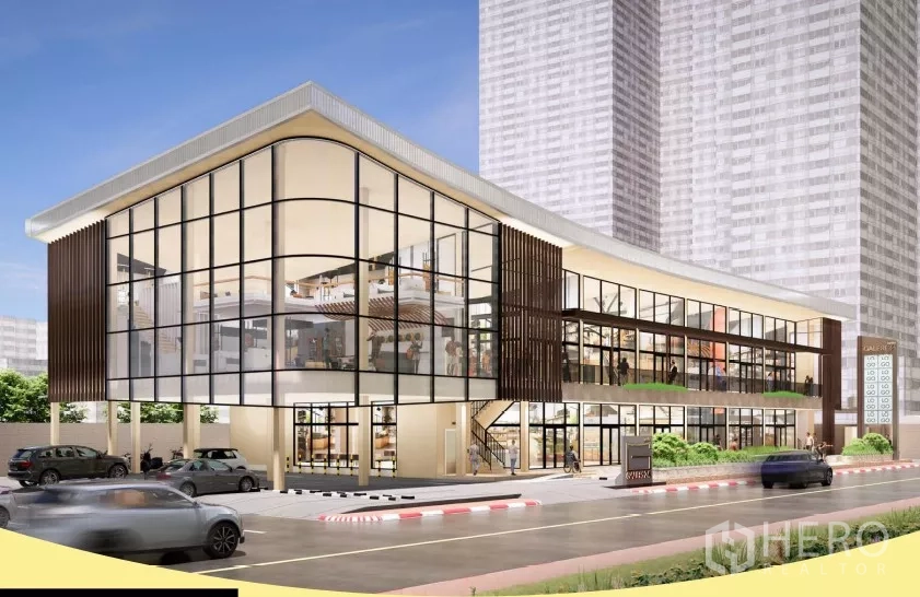 พื้นที่ขายปลีก ให้เช่าในKhlong Toei, Bangkok - ภาพมุมอาคารกระจกโค้ง พร้อมบันไดขึ้นสู่ชั้นสอง