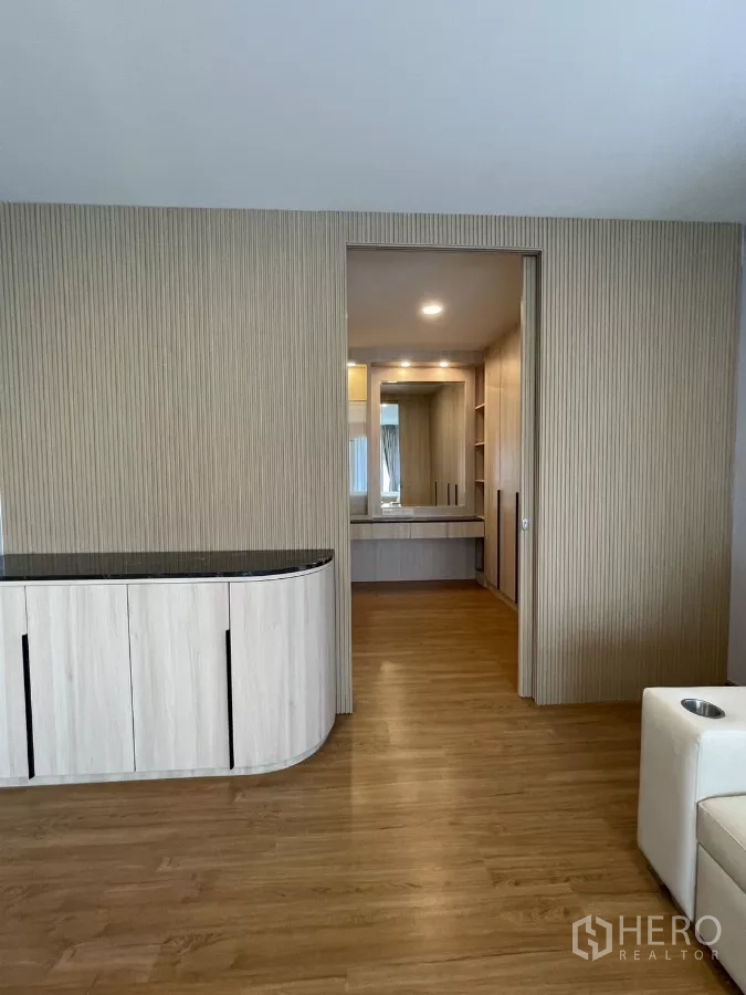 Detached House for rent in Bang Phli, Samut Prakan - Master suite passage to dressing room with curved cabinetry detail.