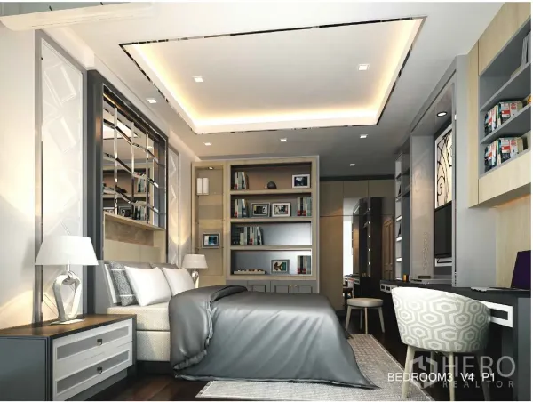 Detached House for rent in Bang Kapi, Bangkok - Spacious bedroom with illuminated tray ceiling, bookcases and a work desk beside the bed.