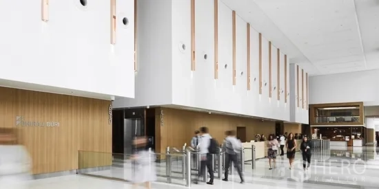 Office Space for rent in Khlong Toei, Bangkok - Bright reception lobby with wood paneling, access control gates, and multiple elevators.