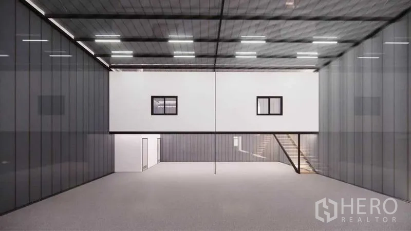 货栈 出租 - 仓库内部挑高空间，LED照明，带夹层办公室、楼梯和光滑混凝土地面