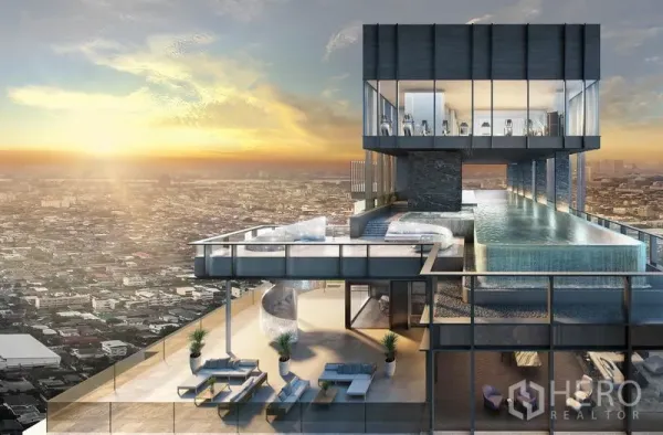 Condominium for sale in Bang Kho Laem, Bangkok - Rooftop infinity pool and sky lounge overlooking the Bangkok skyline at sunset with a glass-walled fitness center.