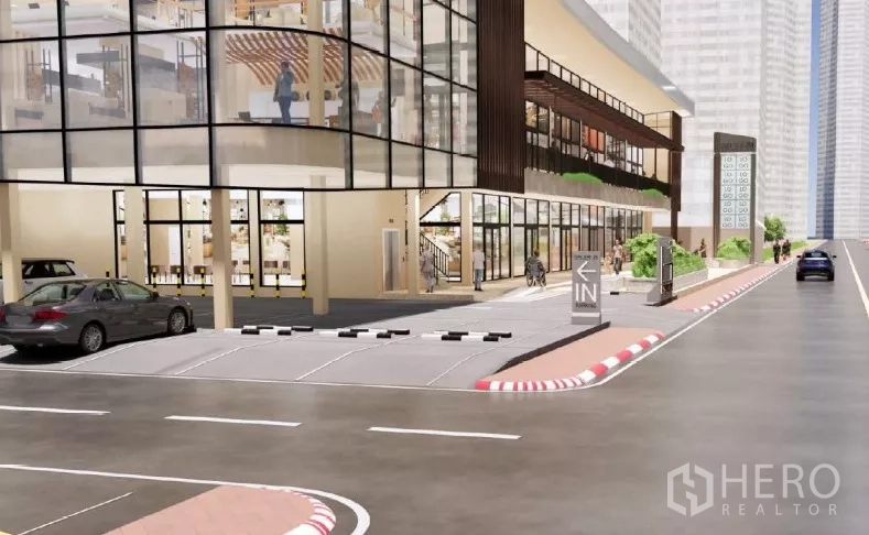 พื้นที่ขายปลีก ให้เช่าในKhlong Toei, Bangkok - ทางเข้า‑ออกสำหรับรถยนต์สู่โครงการค้าปลีก พร้อมมุมอาคารกระจก