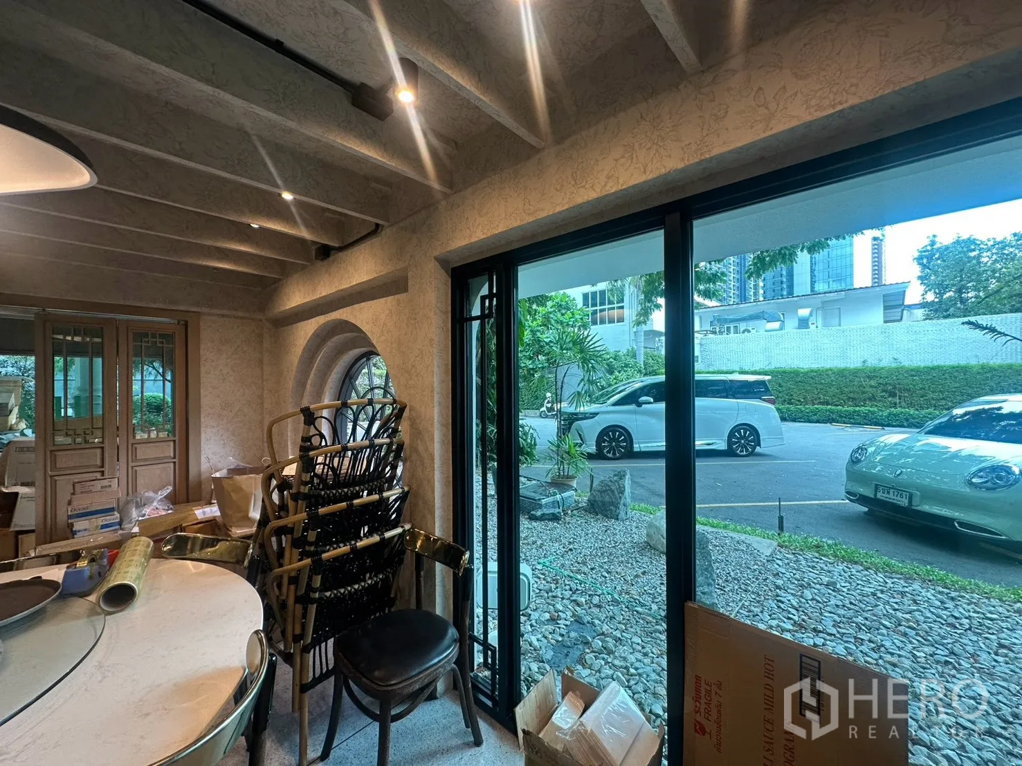 Detached House for rent in Watthana, Bangkok - Interior view to parking through large sliding glass doors.