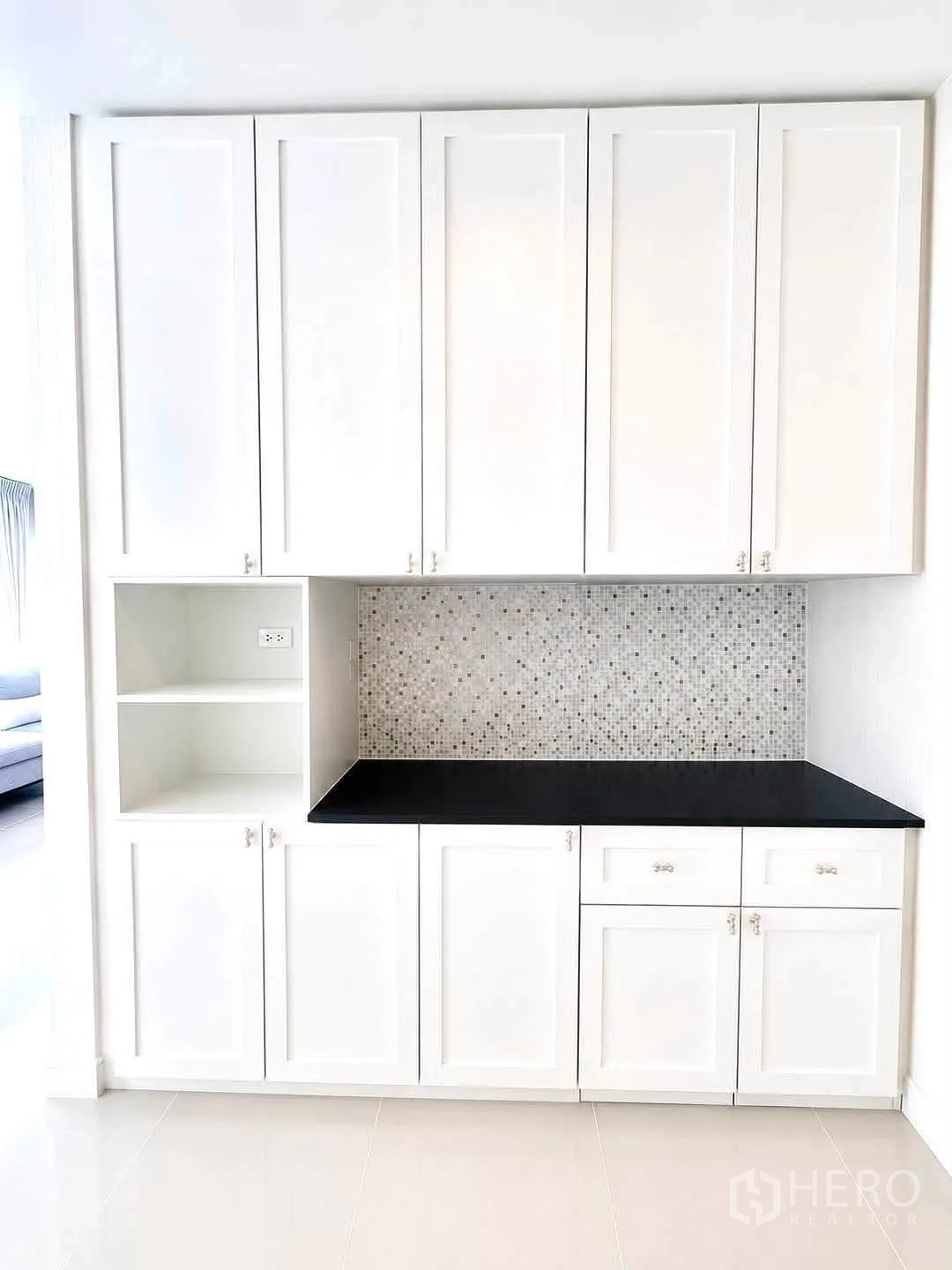 Detached House for rent in Bang Kapi, Bangkok - Built-in white pantry cabinet with mosaic backsplash.