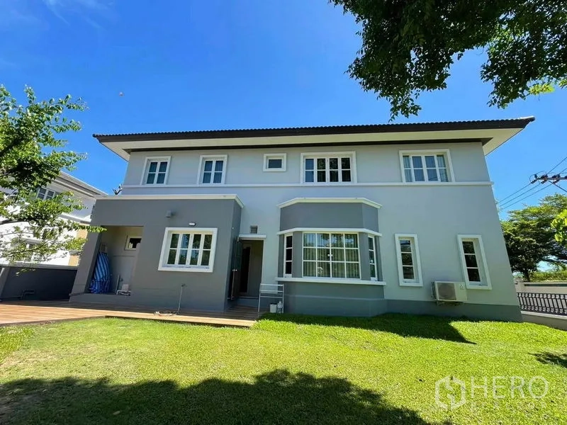 Detached House for sale in Bang Bon, Bangkok - Rear elevation of the home with a big lawn and shady trees