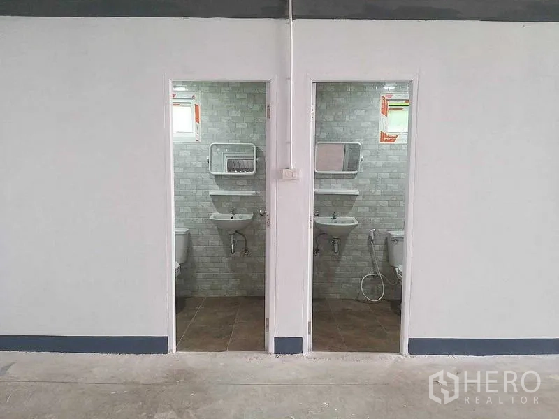 Warehouse for rent in Bang Khun Thian, Bangkok - Two separate restroom entrances inside the warehouse facility.