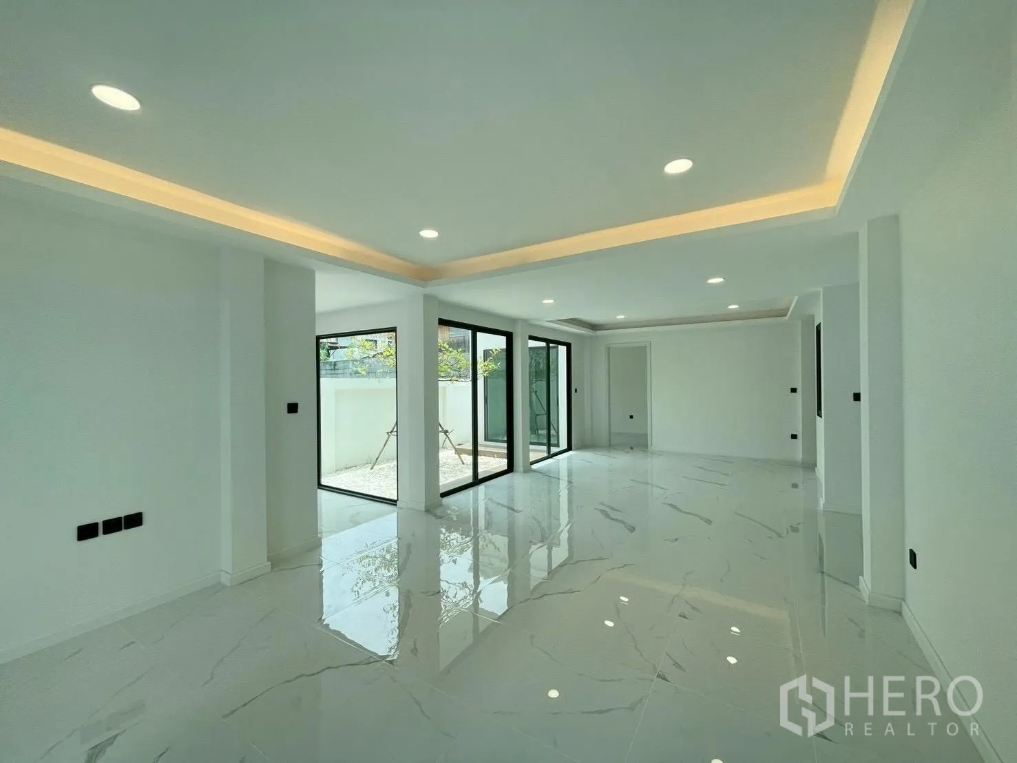Detached House for sale in Chatuchak, Bangkok - Covered entrance porch with double doors and a sliding window.