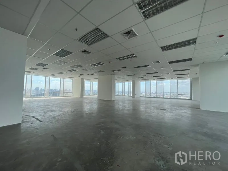 Office Space for rent - Expansive office plate with multiple window lines providing abundant natural light.