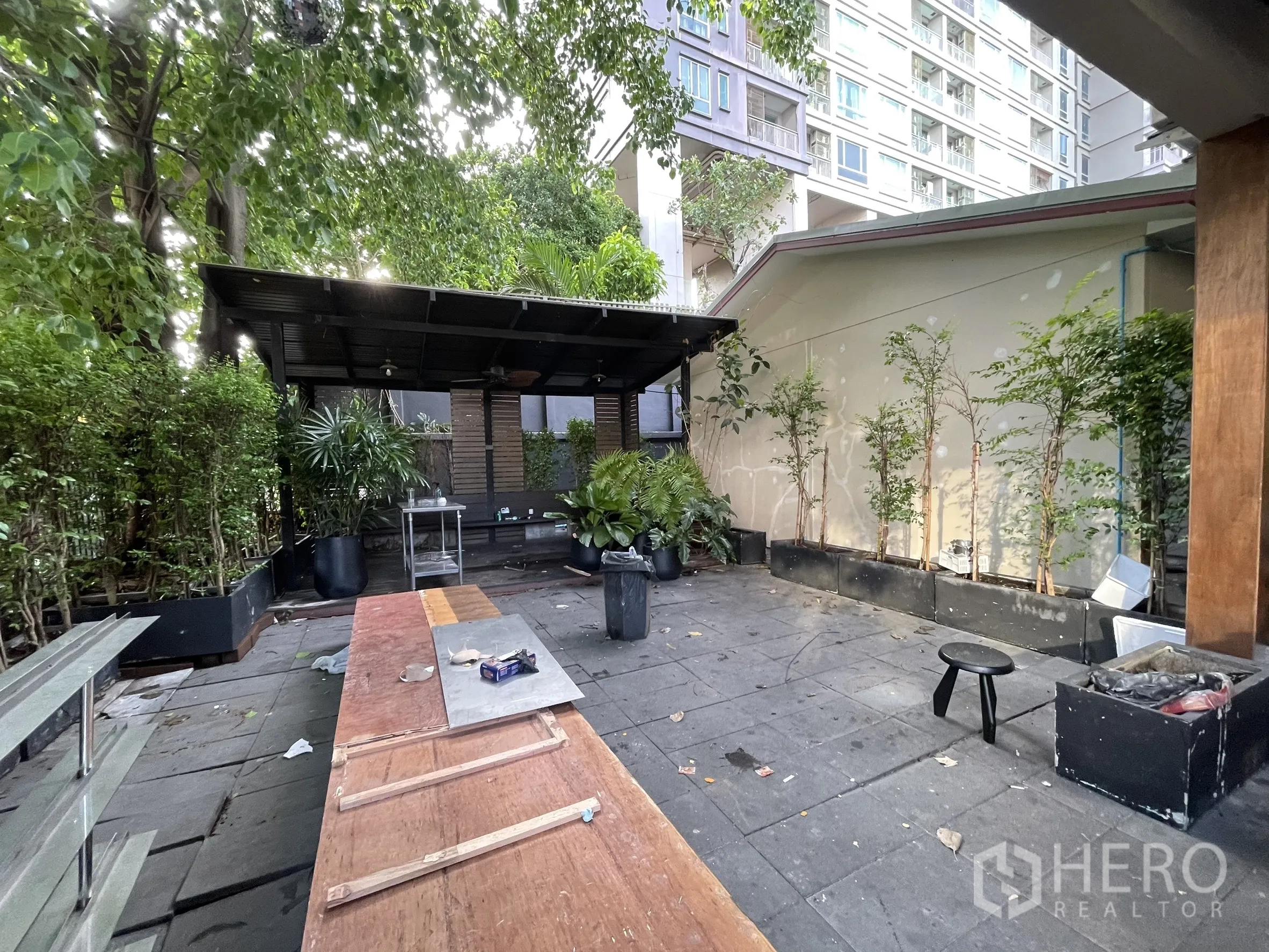 Detached House for rent - Garden corner with shaded pavilion, mature trees and planter boxes.