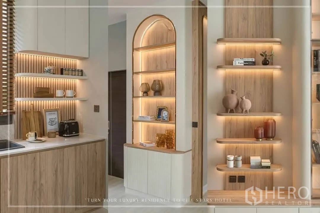 Detached House for rent or sale in Suan Luang, Bangkok - Modern pantry with open shelves and an arched illuminated display niche.