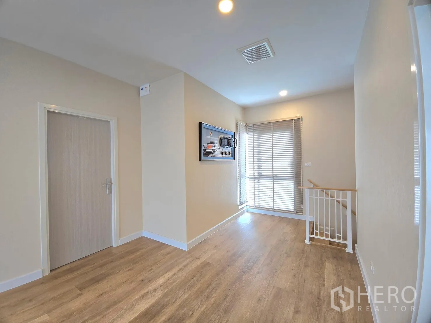 Detached House for rent in Lat Krabang, Bangkok - Bright upstairs landing with window blinds and a staircase.