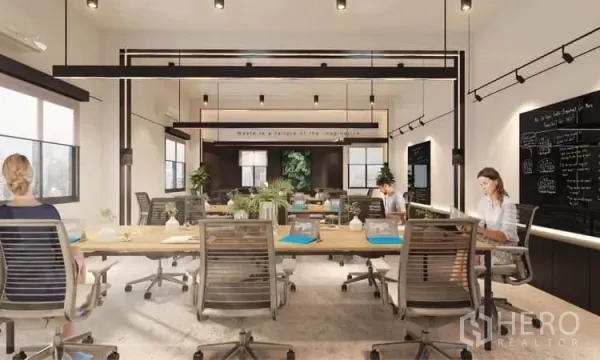 Office Space for rent in Khlong Toei, Bangkok - Modern office interior with shared desks, track lighting, black brainstorming walls, large windows, greenery, and contemporary task chairs.