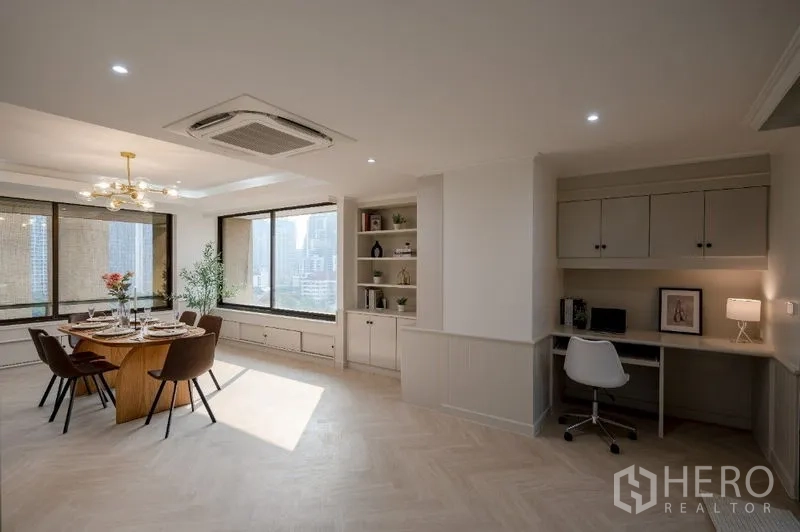 Condominium for sale - Bright dining room with built-in study nook and city views.