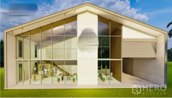 货栈 出租在Samut Prakan - 现代仓库正立面，通高玻璃与人字形屋顶，可见夹层办公室。