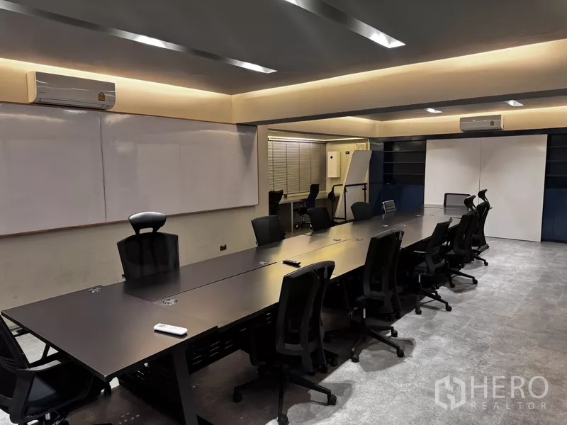 Office Space for rent or sale in Suan Luang, Bangkok - Rooftop pavilion at night with warm step lighting and city views.