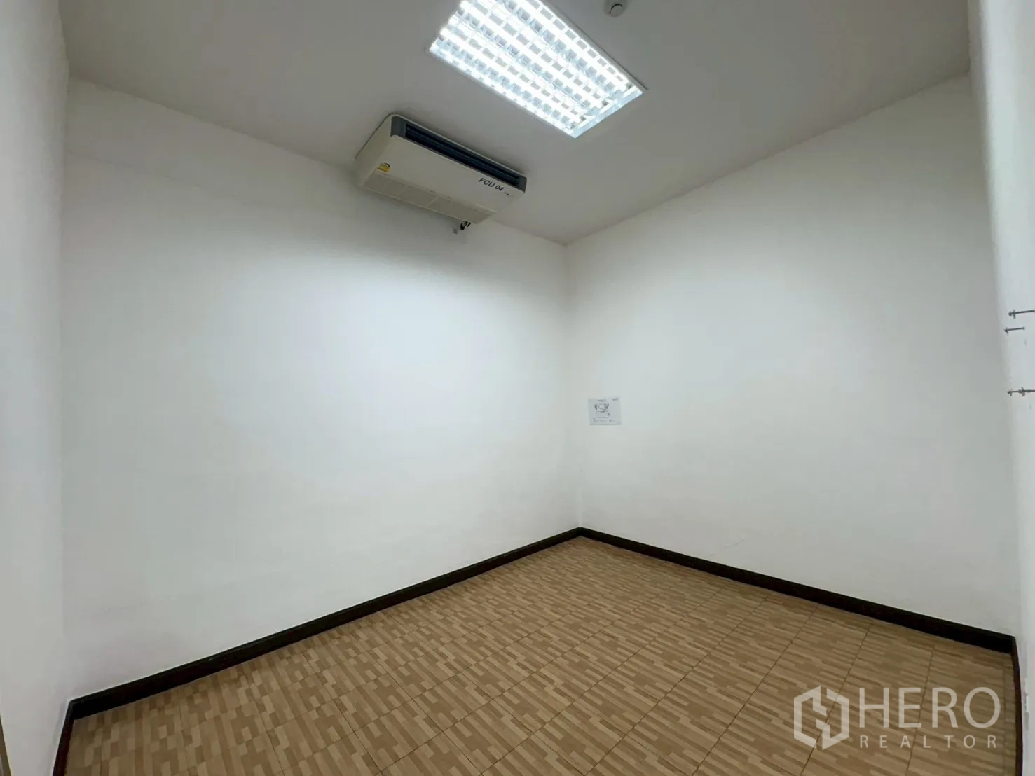 Factory for sale in Bang Bo, Samut Prakan - Men’s restroom with toilet stalls, urinal and gray subway tiles.