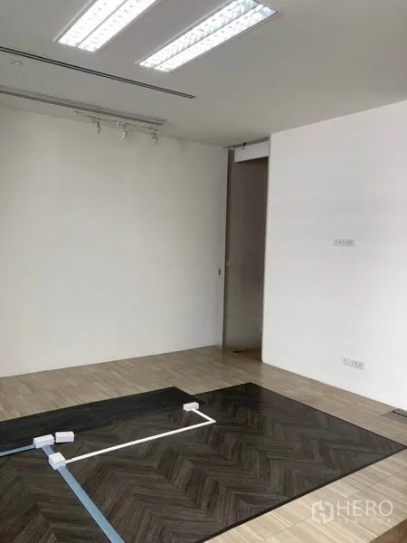 Office Space for rent in Khlong Toei, Bangkok - Private area with wood-look flooring and prepared trunking points.